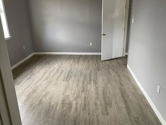 Primary Bedroom w/ walk-in closet and attached bathroom