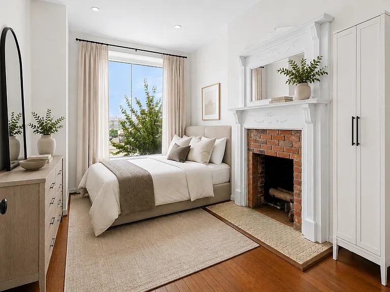 Front room staged as a 2nd bedroom.