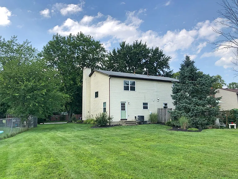 Generous backyard backs to Liberty Elementary School grounds.... easy access to school or playgrounds for kids
