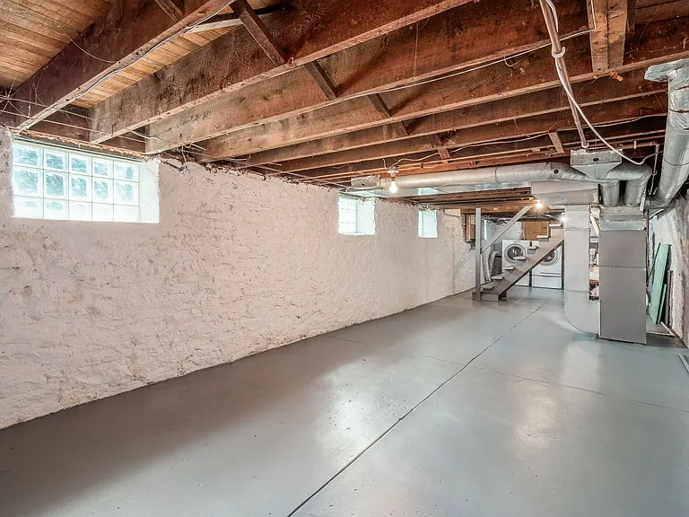 Alternate view of basement with glass block windows.