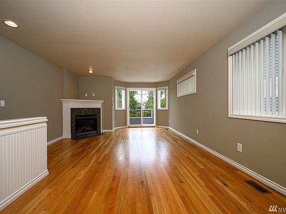 Living room with fireplace and recess lights