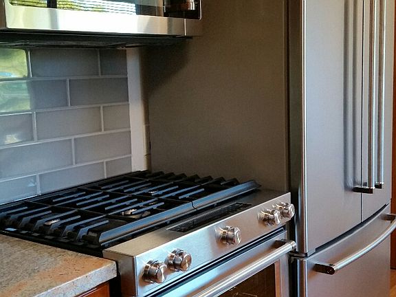 Gas stove with microwave hood