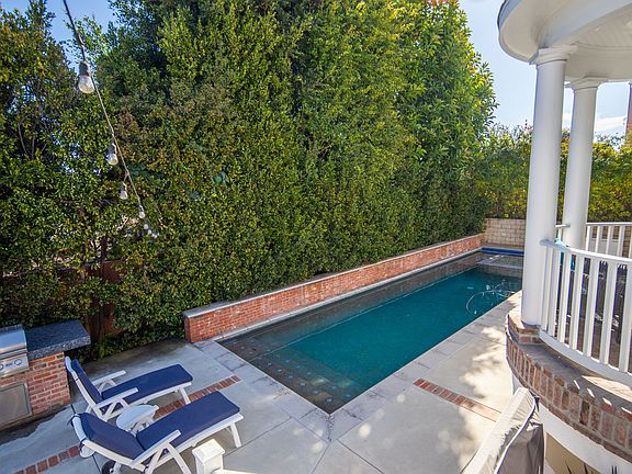 Pool area with kid safe electric cover