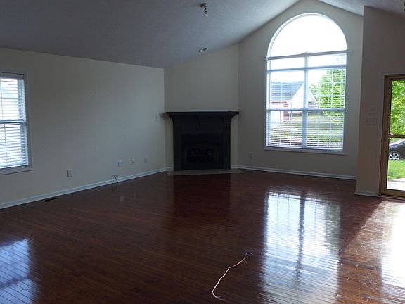 Great room looking toward front of house and fireplace