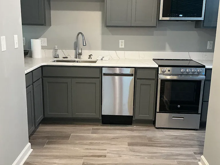 Kitchen, new quartz countertops, new flooring, new cabinets