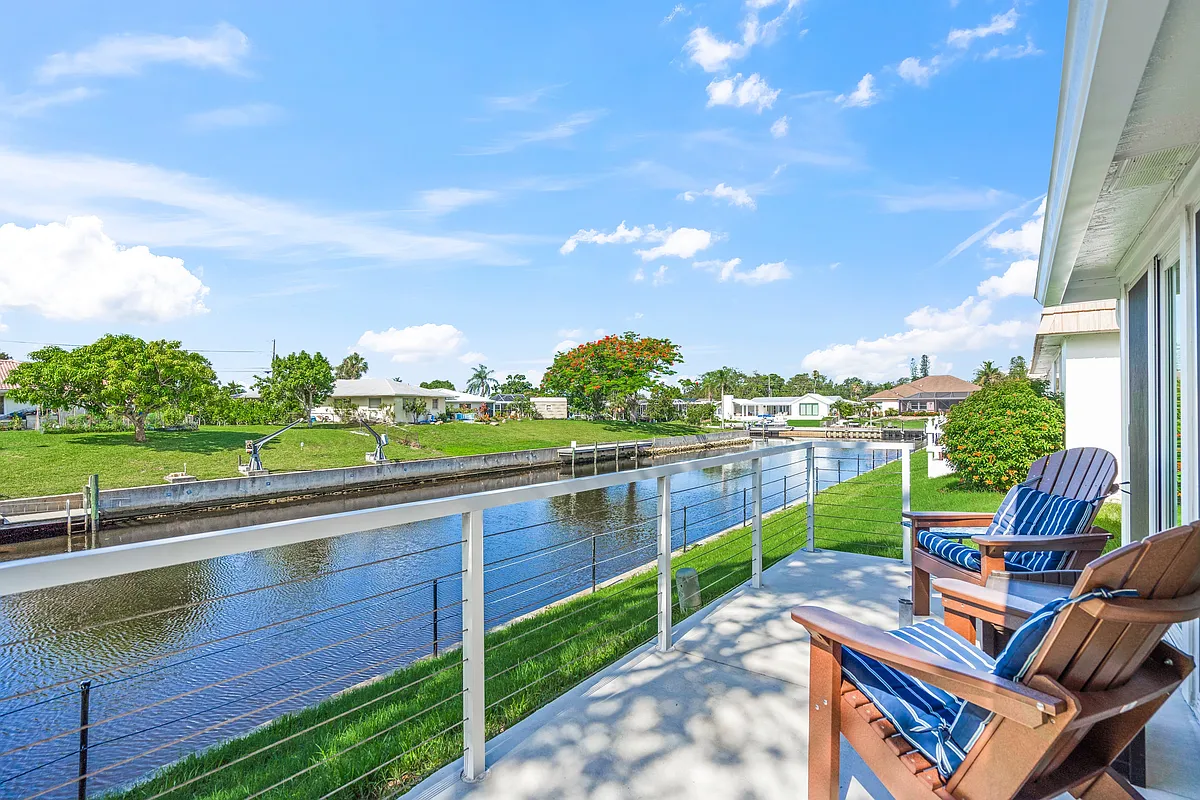 Canal view facing west. Enjoy brilliant sunsets. - Riverbluff Pkwy