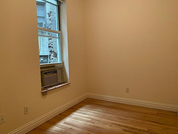 5th image of 108 E 4th St APT 11