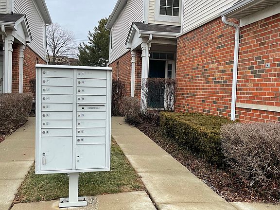 Mailbox is to the left of the home