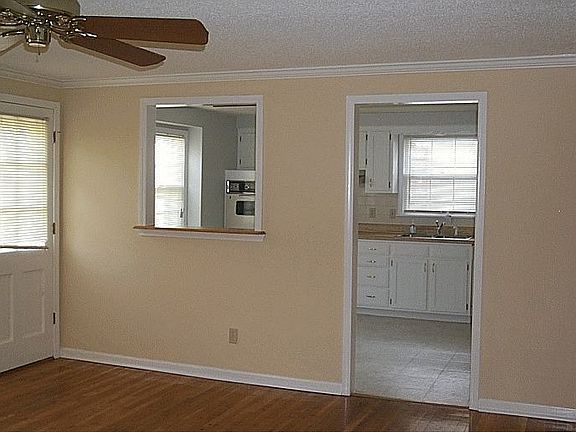 Family room view to Kit & back door