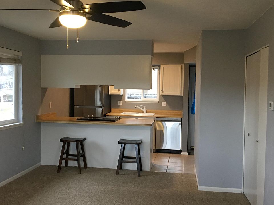 Living room with storage closet on the right