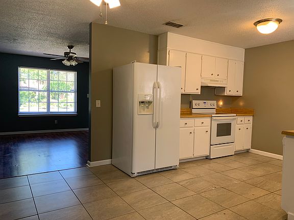 kitchen and showing into living room