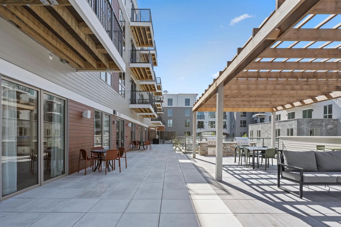 At Modera Newton, select apartment homes feature private balconies and patios.