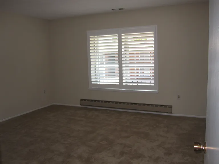 master bedroom wood shutters