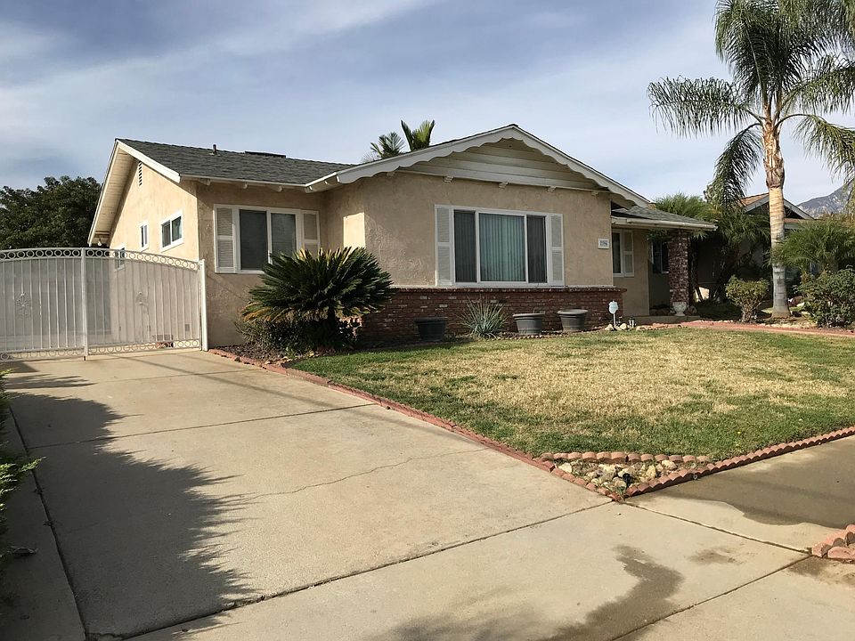 Front of House with Driveway