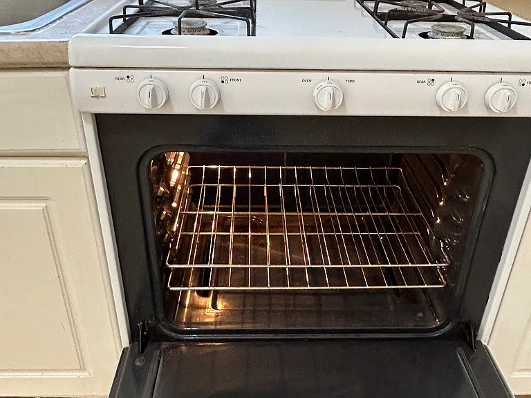 STOVE CLEANED IN, OUT, AND UNDER IT.