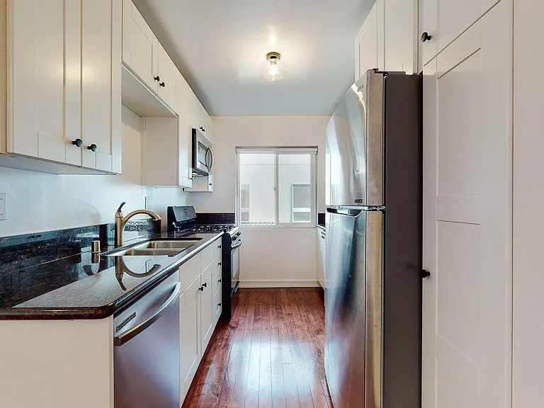 KITCHEN: ALL NEW MODERN CABINETS W/ GRANITE COUNTERTOPS