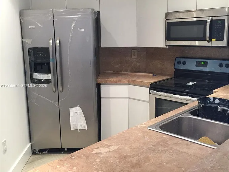 9711 Fontainebleau Blvd #D101 — Photo 3
