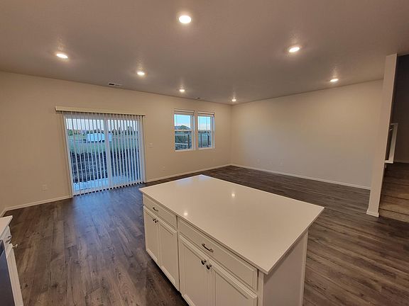 View from kitchen into living room and dining room