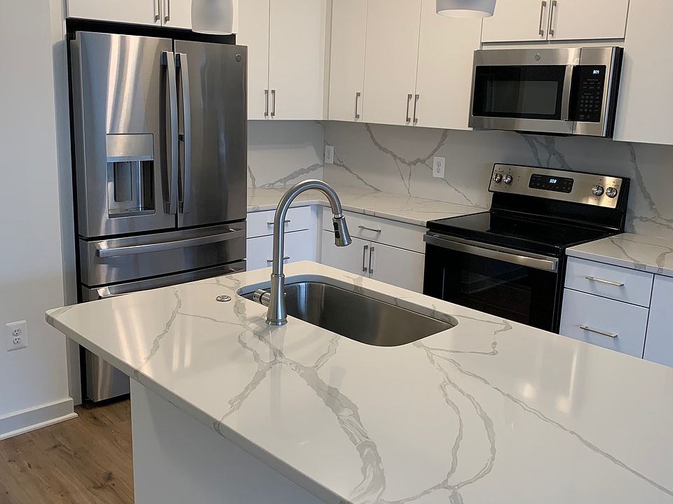 Kitchen Island, appliances and storage cabinets