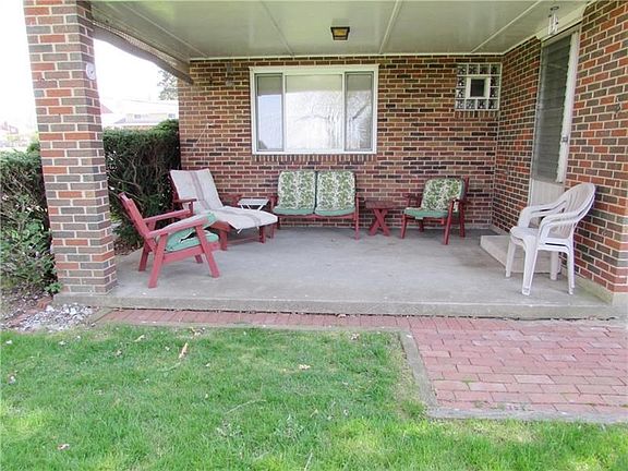 You will be spending Plenty of time in the Warmer Months on your Beautiful Covered Back Porch