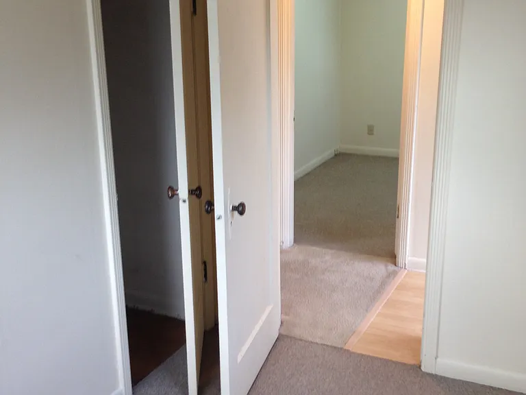 Very small bedroom/office located to the left of the entry door