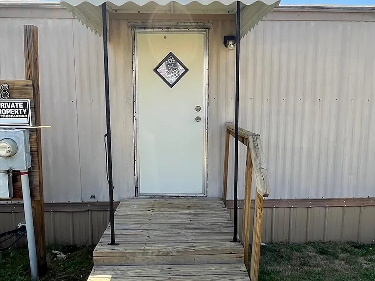 Off road parking at back door.