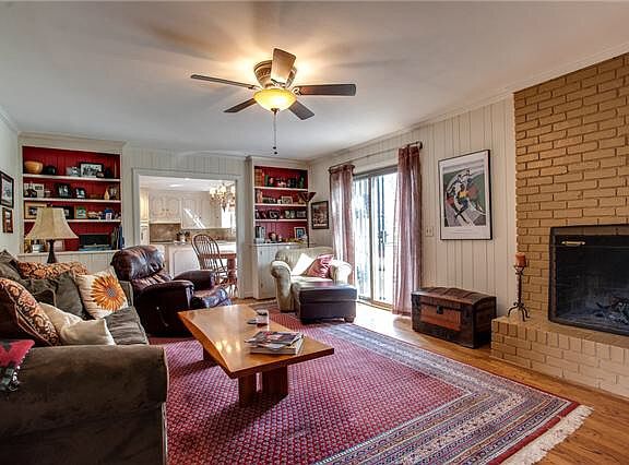 Den that opens up to kitchen
