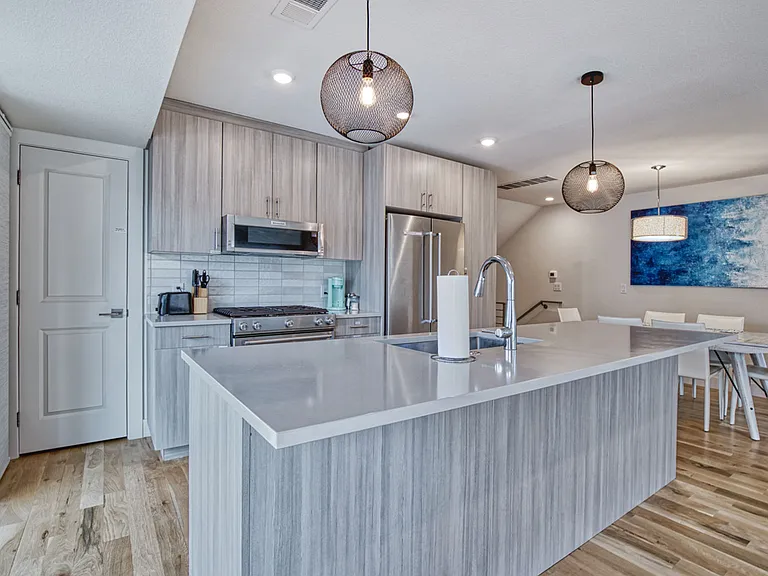 Kitchen with Kitchen aid appliances, gas stove and large pantry
