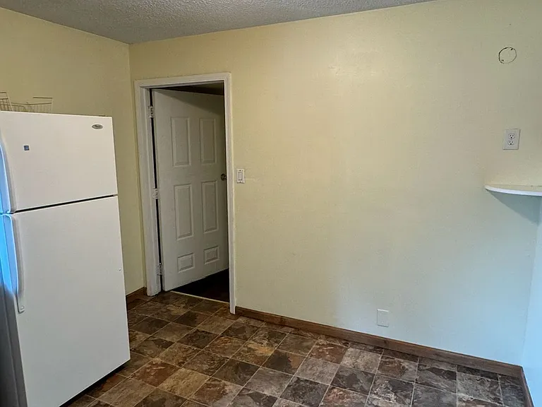 Spacious kitchen with basement access