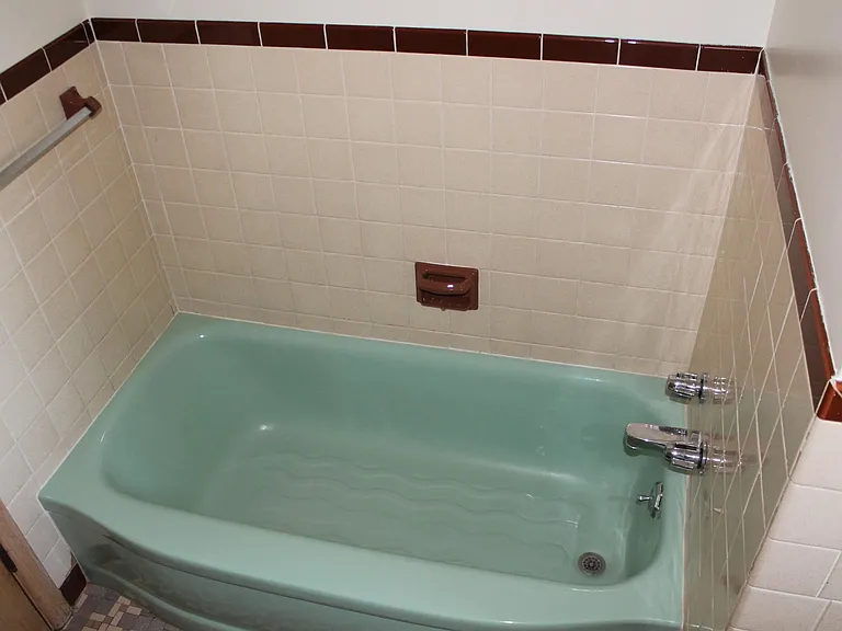 Back bathroom with tub