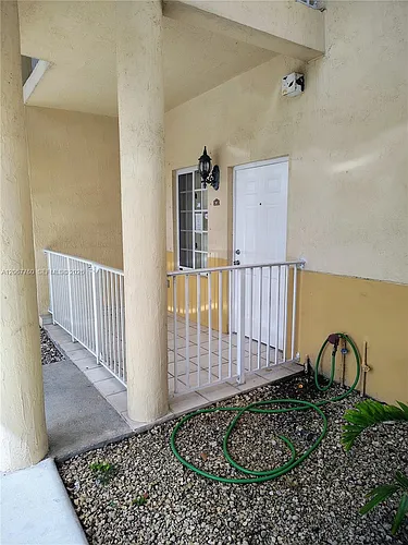 6990 NW 179th St #101-2 Photo 1