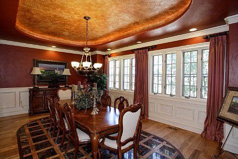 Formal dining hall with tray ceiling