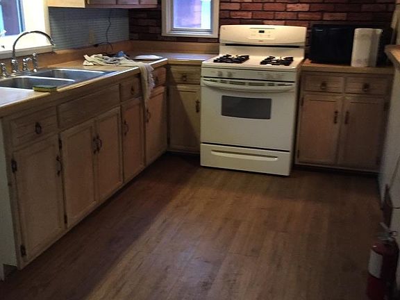Kitchen and pantry have laminate floor.