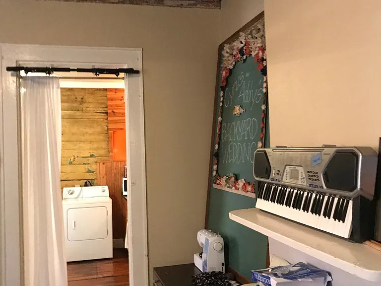 2nd bedroom with original fire mantle