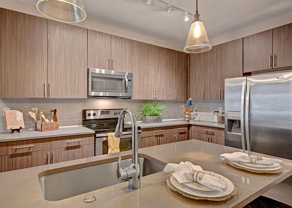 Stainless Appliances and Tile Backsplash