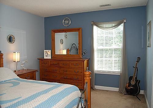 One of three upstairs bedrooms