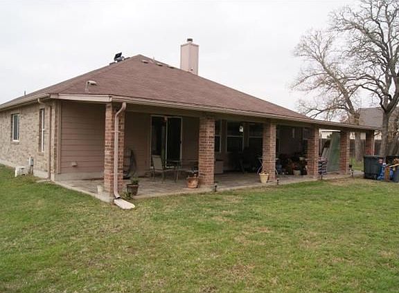 Relax on large (covers full back of the house) covered patio w/
