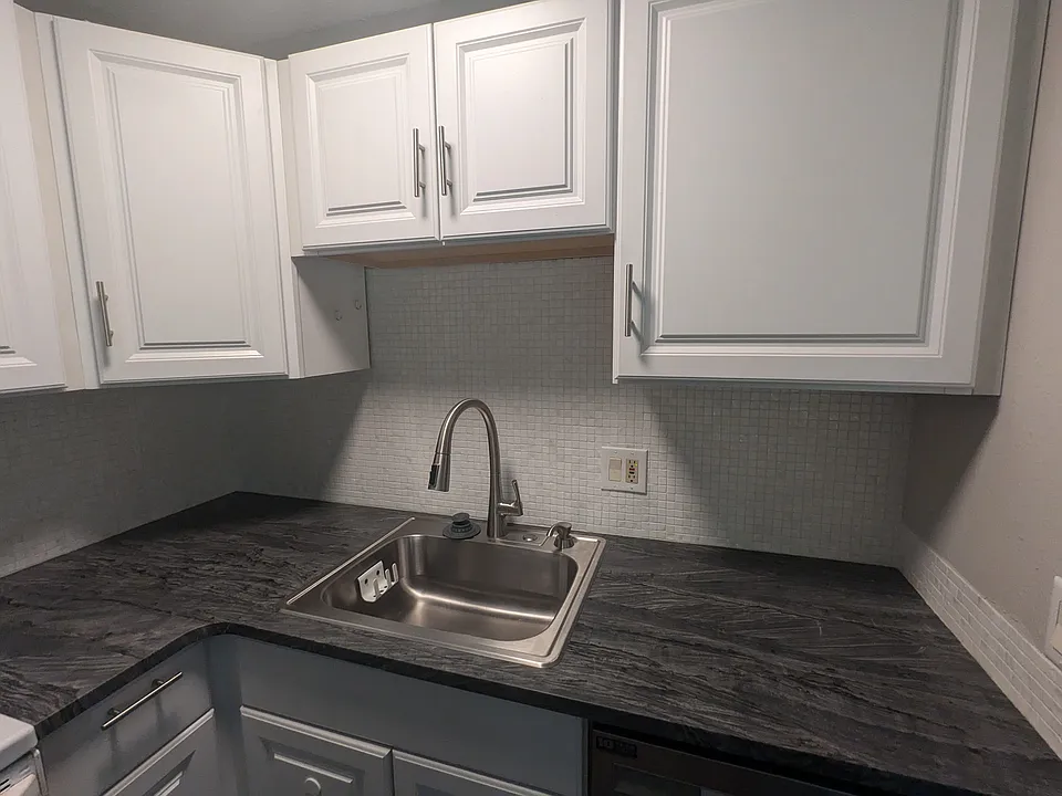 New cabinets, countertops, sink & faucet