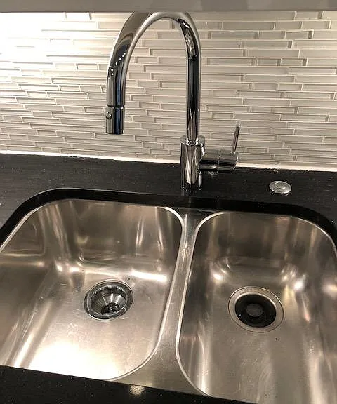 Stainless Steel double sink with garbage disposal and Grohe faucet