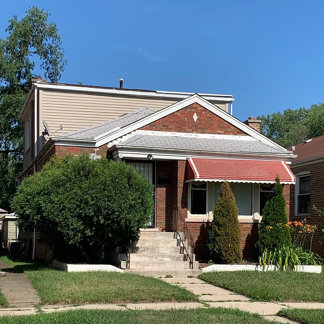 9855 S Woodlawn Ave photo 1