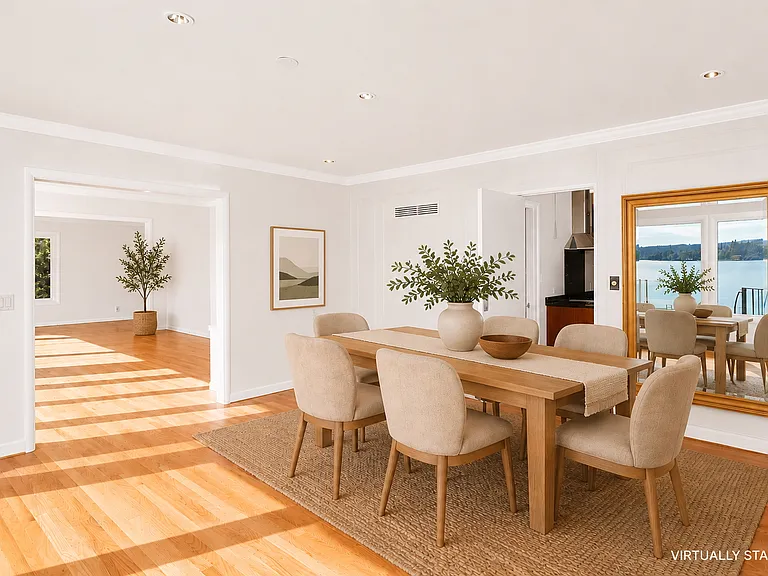 dining room opens to kitchen, media and living rooms