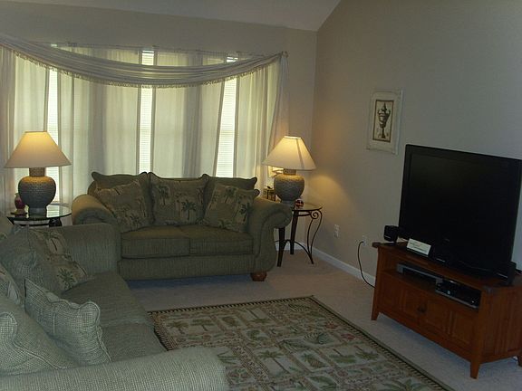 Large living room w/ cathedral ceilings