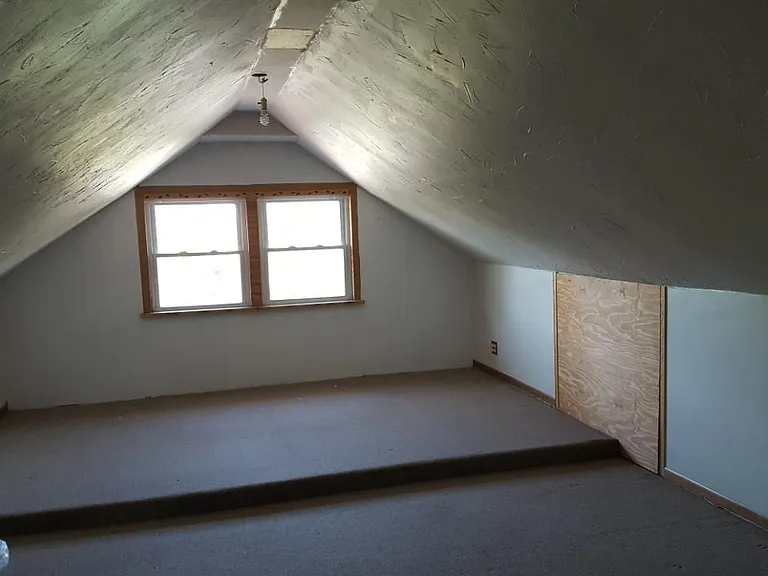 Attic space for exclusive use of second floor tenants with ample space for storage.