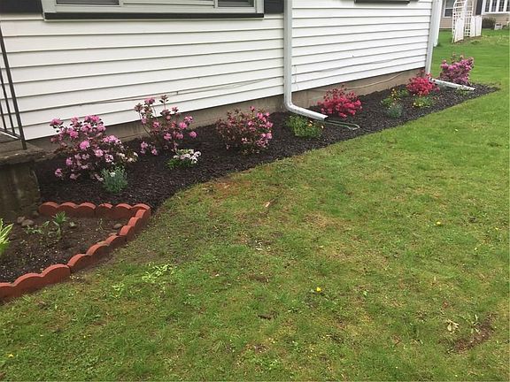 Updated landscaping, 2017. (Exterior front.)