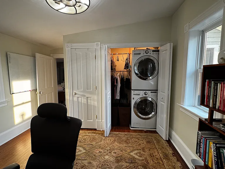 4th bedroom or office with laundry. Separate closet to left of laundry.