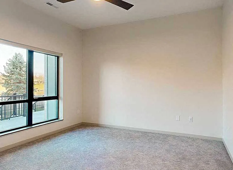 Step into our one-bedroom, first-floor Elk apartment, beautifully designed with rich, dark cabinetry and thoughtful finishes that elevate your living experience.
