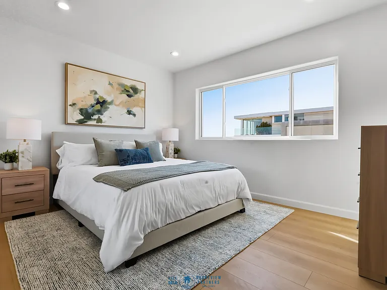 Bedroom 2 features full bathroom, large closet, and stunning ocean views.
