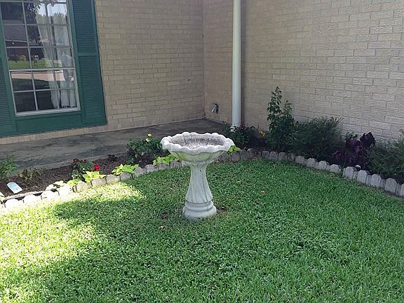 Another view of recently installed landscaping and bird bath!