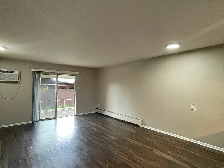 Experience the openness and warmth of this roomy living space, perfect for relaxation. Experience the openness and warmth of this roomy living space, perfect for relaxation.
