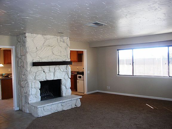 Living Room with wood burning fireplace